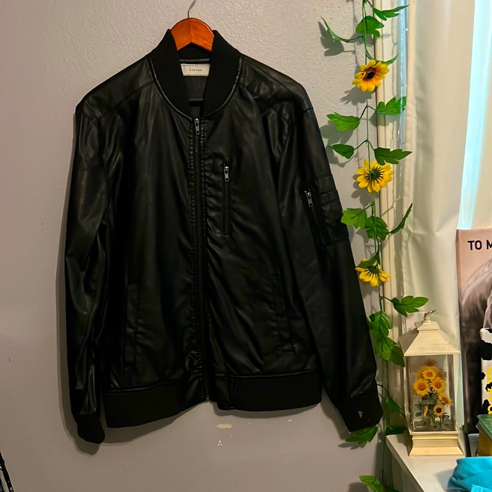 brand is five four, size medium/large, black faux leather
